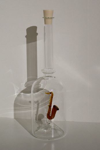 Glasflasche Saxophon